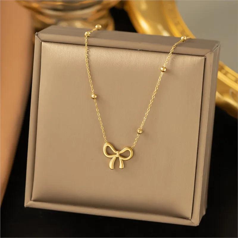 ANENJERY L316 Stainless Steel Beads Chain Hollow Bowknot Pendant Necklace for Women Niche Simple Jewery Accessory