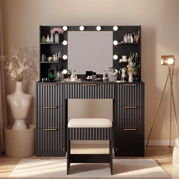 Black particleboard with a melamine finish, 7 drawers, 4 shelves, a dressing table set with 10 three-tone light bulbs, a power strip, and a grille.