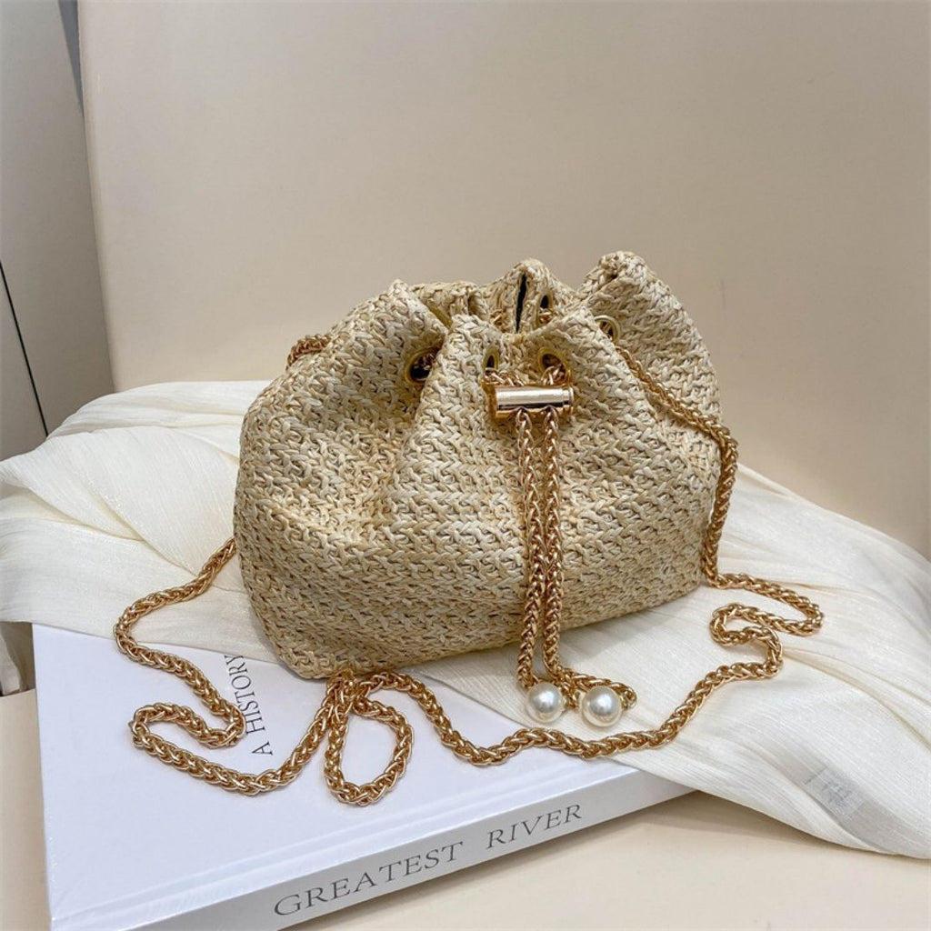 Ladies' mini straw woven bucket crossbody bag, hand woven pearl decoration drawstring straw woven small bag, gold chain shoulder bag, summer beach vacation special