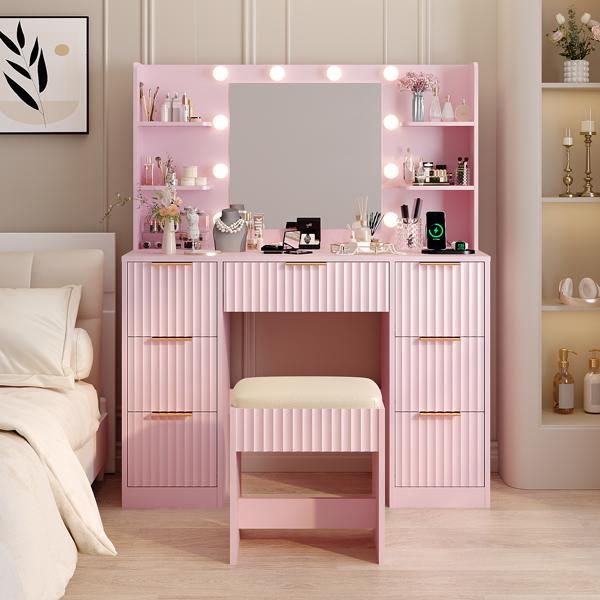 Pink particleboard with a 7-drawer, 4-shelf dressing table set with 10 three-tone light bulbs, power strip, and grille.